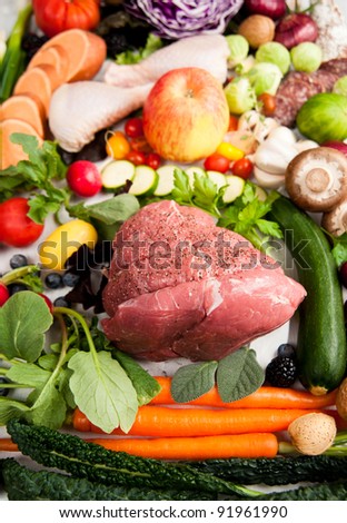 Assortment of Various Healthy Foods. Vegetables, Meats, Fruit, Oil, Nuts, Berries and Fish