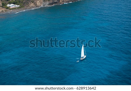 Similar – Image, Stock Photo Lonely yacht in gray water with dark mountains under cloudy sky