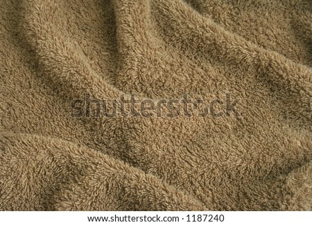 Brown towel terry cloth. Soft texture cloth. Look at my gallery for more backgrounds and textures