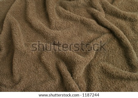 Brown towel terry cloth. Soft texture cloth. Look at my gallery for more backgrounds and textures