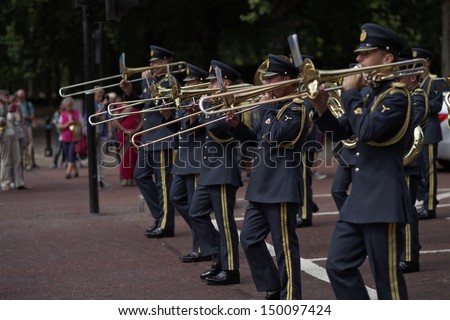 LONDON - AUG 12 : The changing of the guard ceremony at Buckingham Palace on August 12th, 2013 in London, UK. On this occasion, the Royal Air Force soldiers were part of the parade.