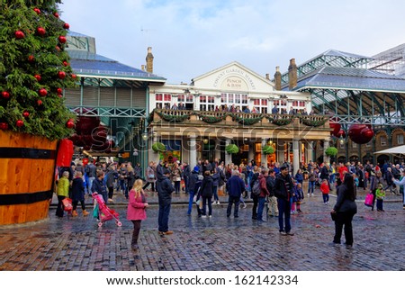 LONDON - NOV 9 : Covent Garden Christmas market pictured on November 9th, 2013, in London, UK. The covent garden christmas market started in 1654 and is one of the oldest market in Europe.