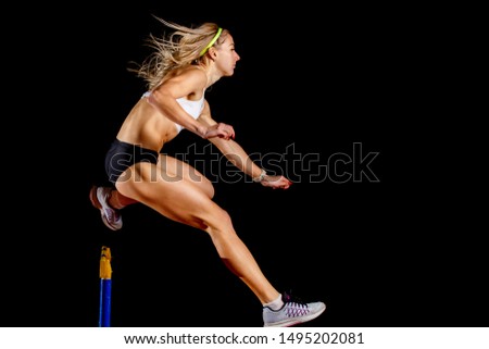 Similar – Image, Stock Photo Strong sportswoman jumping over sandy hill