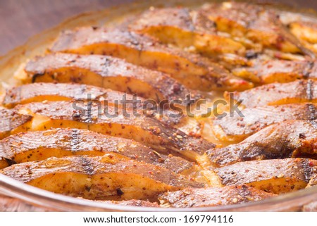 Cooked fish with spices baked  in oven