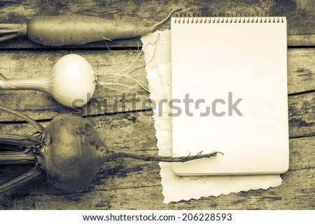 Empty Recipe Card  on Wooden Rustic Background with Fresh Vegetables. Menu list. Toned image