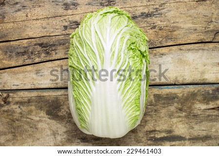 Fresh chinese cabbage on wooden background. Eco food