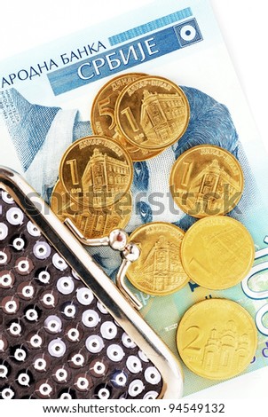 various serbian dinars coins over hundred banknote and silver purse