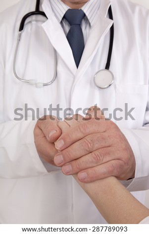 Doctor comforting patient