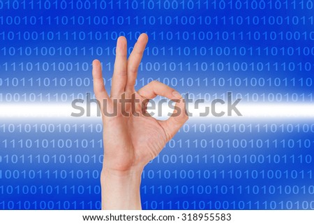 Hand gives good sign before numeric code