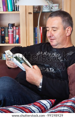 Man with a book while reading