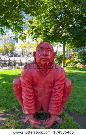 VANCOUVER, BC, CANADA - AUG15, 2010 - Close up of Chinese sculptor Wang Shugang\'s bright red art piece \