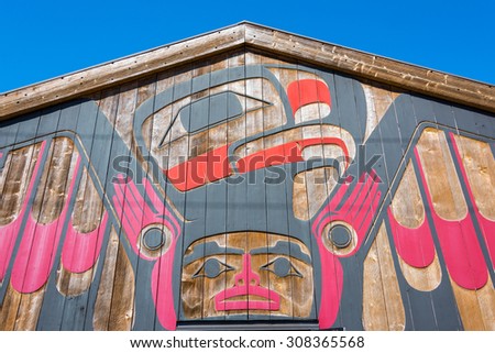 Tofino, Vancouver Island, BC August 13, 2015 - Beautiful First Nations art on front of the Eagle Aerie Gallery, which is owned, operated & showcases traditional artwork by artist Roy Henry Vickers.