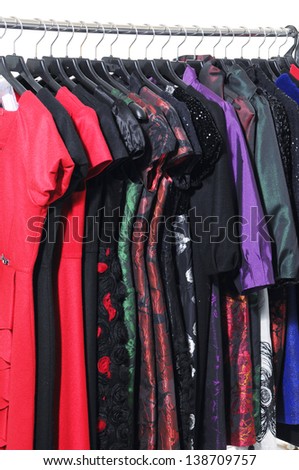 Fashion evening gown and coat clothing rack display