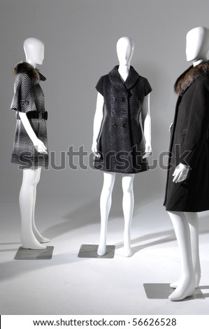 Set of Three dummies dressed in black and white fur coat