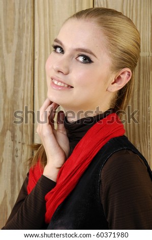 Portrait of pretty young Woman Wearing scarf In Studio