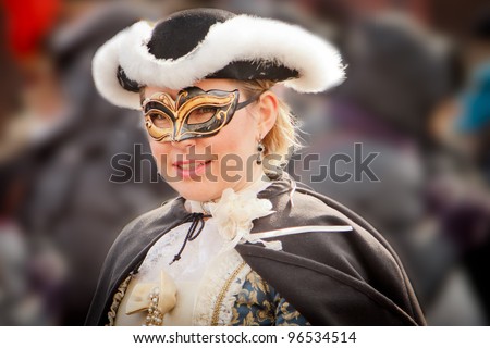 VENICE, ITALY - FEBRUARY 12: Lady in costume, mask, during the traditional Venice carnival on february 12, 2012 in Venice,  Italy.