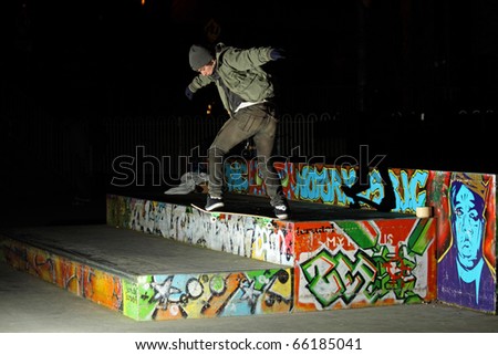 LIMERICK CITY, IRELAND - 28 NOV: Amateur skate boarder Cian Eades, filming skateboard footage for JART skateboards on 28th NOV, 2010 at Limerick City Skate Park, Ireland.