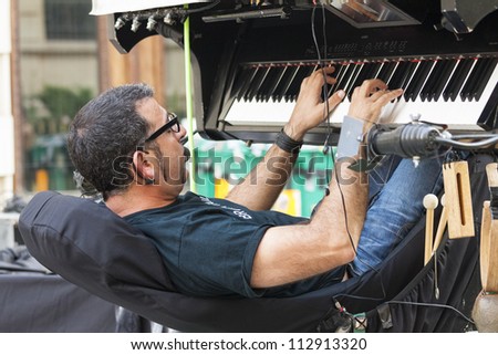 BUCHAREST, ROMANIA - SEPTEMBER 13: David Moreno rehearses before his show during B-FIT in the Street International Street Theater Festival on September 13, 2012 in Bucharest, Romania.