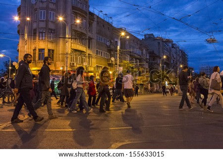 BUCHAREST, ROMANIA - SEPT 22: People join the protests for the 22nd day against the plan to open Europe\'s largest open-cast goldmine in the Rosia Montana on Sept 22, 2013 in Bucharest, Romania.