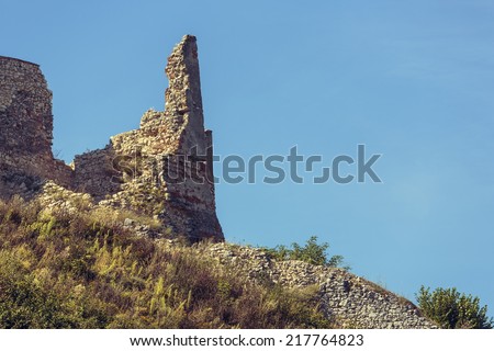 Old destroyed ruined walls of medieval Rasnov citadel in Rasnov, Brasov county, Romania.