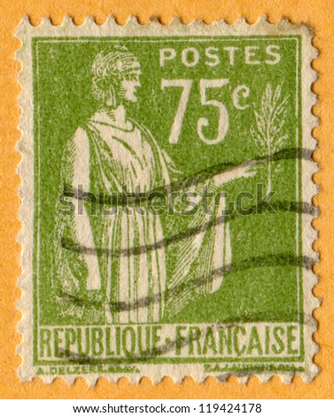 FRANCE- CIRCA 1937 : A stamp printed in France (French Republic), shows Peace with Olive Branch. Scott catalog 272 A45 75c olive green, circa 1937