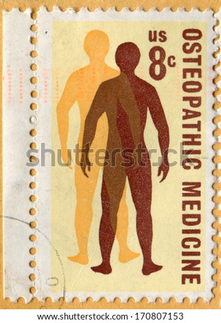 USA- CIRCA 1972: Postage stamp printed in United States of America shows ManÃ¢Â?Â?s Quest for Health. Osteopathic Medicine. Scott Catalog A883 1469 8c yellow, orange, brown, circa 1972