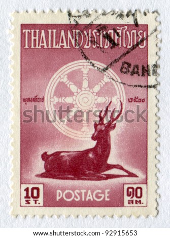 Thailand - CIRCA 1957: Postage stamp printed in Thailand  shows a Dharma Wheel and a Deer. Buddha 2500th Birth Anniversary Set, circa 1957