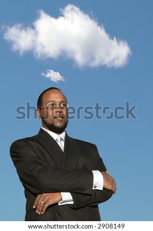 photo of a african american business man in deep thought with thought cloud above his head