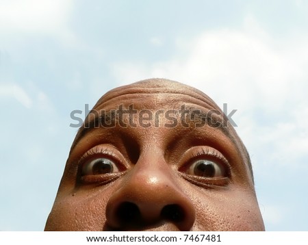 three quarter head shot of a African American male showcasing surprise facial expression