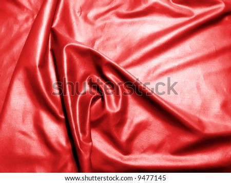 close up photo of a red satin sheet