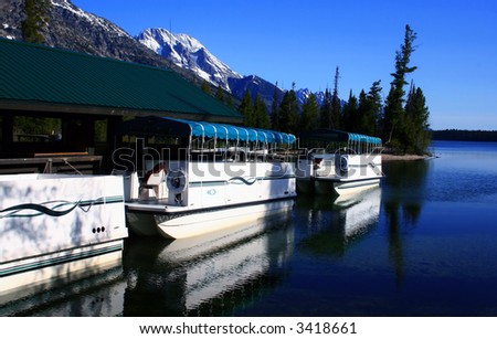 Boats waiting to party on Jenny Lake, Grand Teton National Park, Wyoming