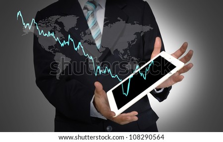 Business Man present world graph with tablet PC