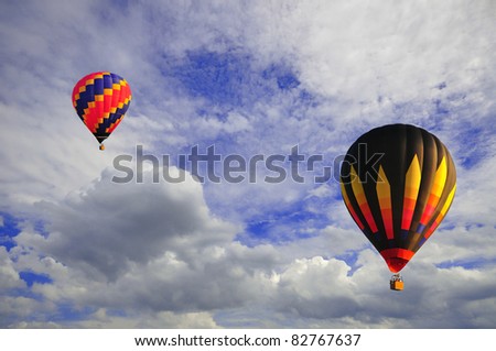Hot air balloon with beautiful blue sky and nice cloud in Thailand.