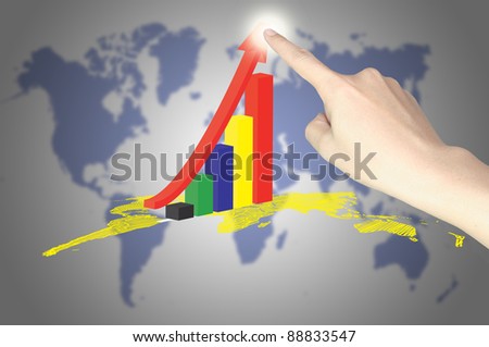 hand of business man press the growth up graph on world map