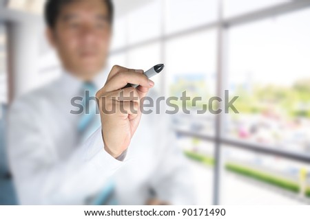 Business man on office background
