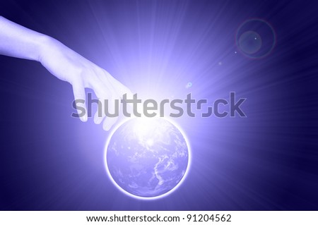 Hand touch earth globe as environment concept