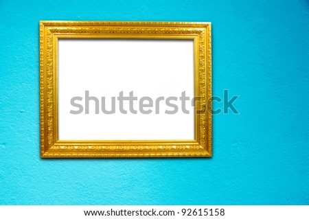 Gold frame on blue cement background