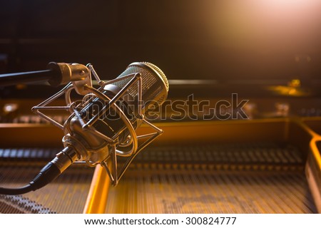 Recording microphone above grand piano