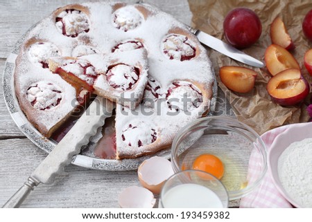 Cake. Fruit cake. Plum cake. Dessert of sponge cake and plums. Food style
