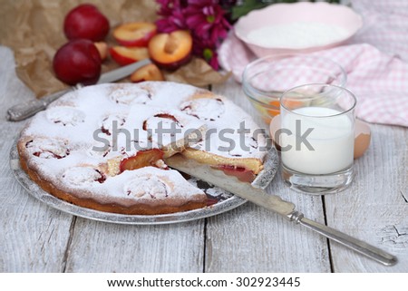 Fruit cake. Plum cake. Dessert of sponge cake and plums.