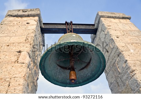 Old bronze bell for alarm signals in dense fog. Sevastopol