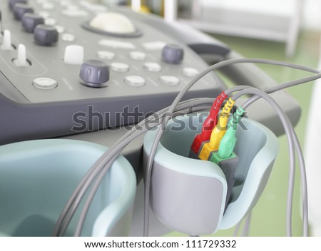 Fragment of an ultrasound machine. Color ECG sensors.
