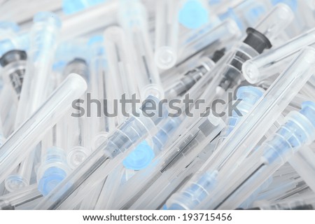 Medical needles. A pile of needles.