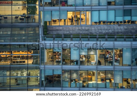 LONDON - OCT 27: people work in an office building in London on October 27, 2014. Full-time employees in the UK work longer hours than the EU average, according to the Office for National Statistics.