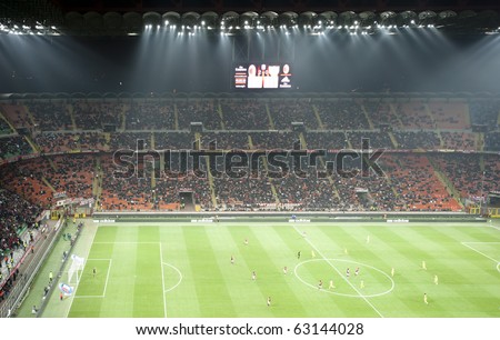 MILAN- OCTOBER 16: Crowd of supporters at Italian Championship soccer game, AC Milan - Chievo on October 16, 2010 in Milan
