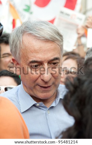 MILAN, ITALY - MAY 1st: Giuliano Pisapia, mayor of Milan, releases an interview during the May Day celebration in Milan on May 1st 2011