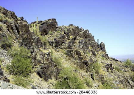 Arizona mountain against a blue sky, in horizontal orientation