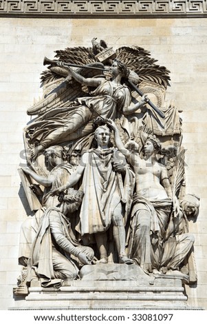 Color DSLR image of sculpture carvings on the side of the Arc de Triomphe, Paris, France, a popular and historic tourist attraction. Vertical.
