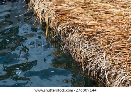 Detail of traditional reed island on lake Titicaca, Floating island of Uros, Peru
