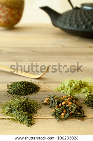 Different sorts of Japanese green teas in leaf form and powder